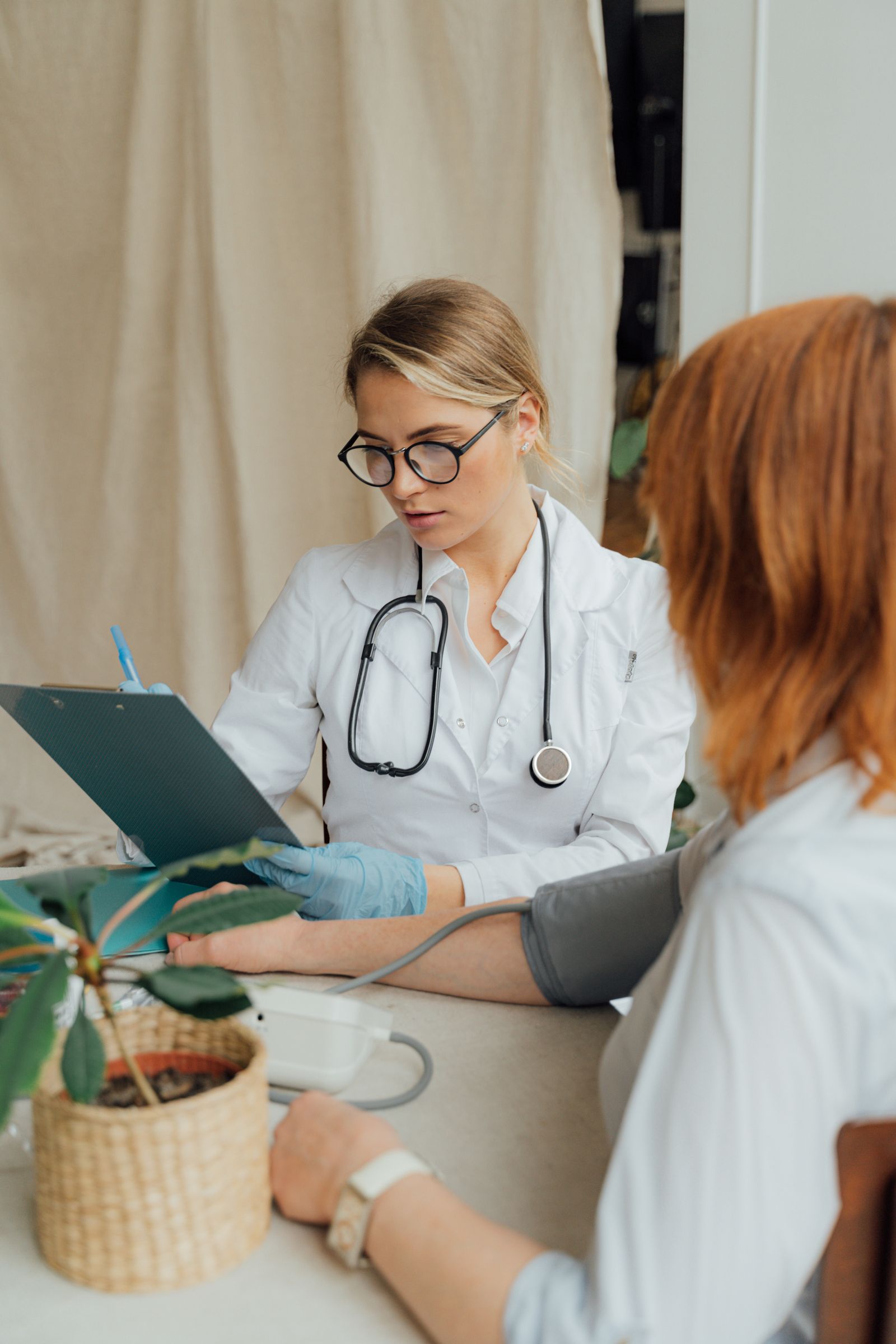 Patient speaking with a doctor during a consultation